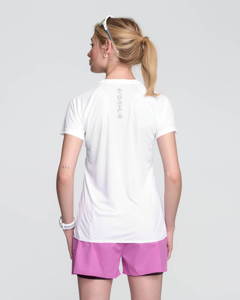Back view of the white and pink Dæhlie Run 365 women's t-shirt, ideal for race day or daily training.