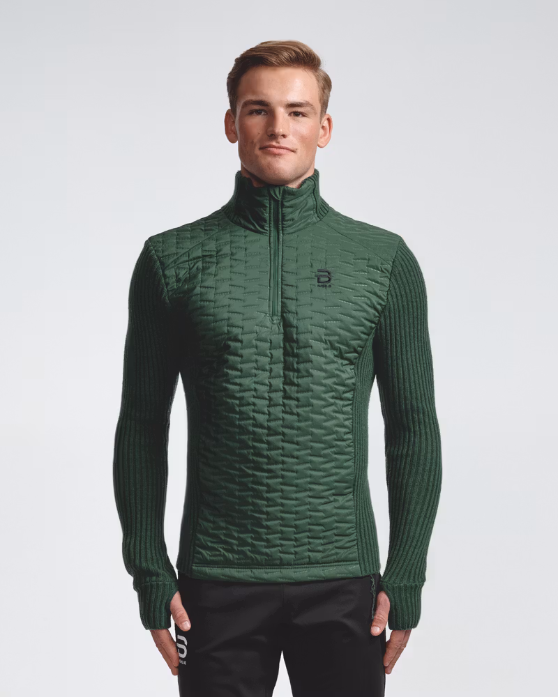 Back view of a man wearing the green Half Zip Comfy 2.0 sweater, perfect for an active lifestyle.