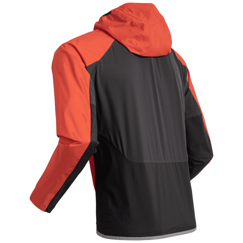 Back view of the spicy orange Dæhlie Jacket Advance Light, featuring a contrasting black panel for stretch and ventilation.