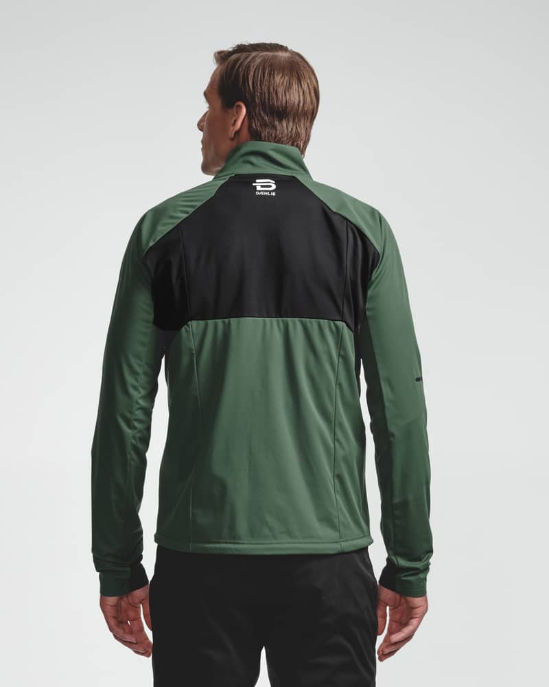 Dark green men's Jacket Challenge 3.0, back view on model showing athletic fit for nordic skiing.