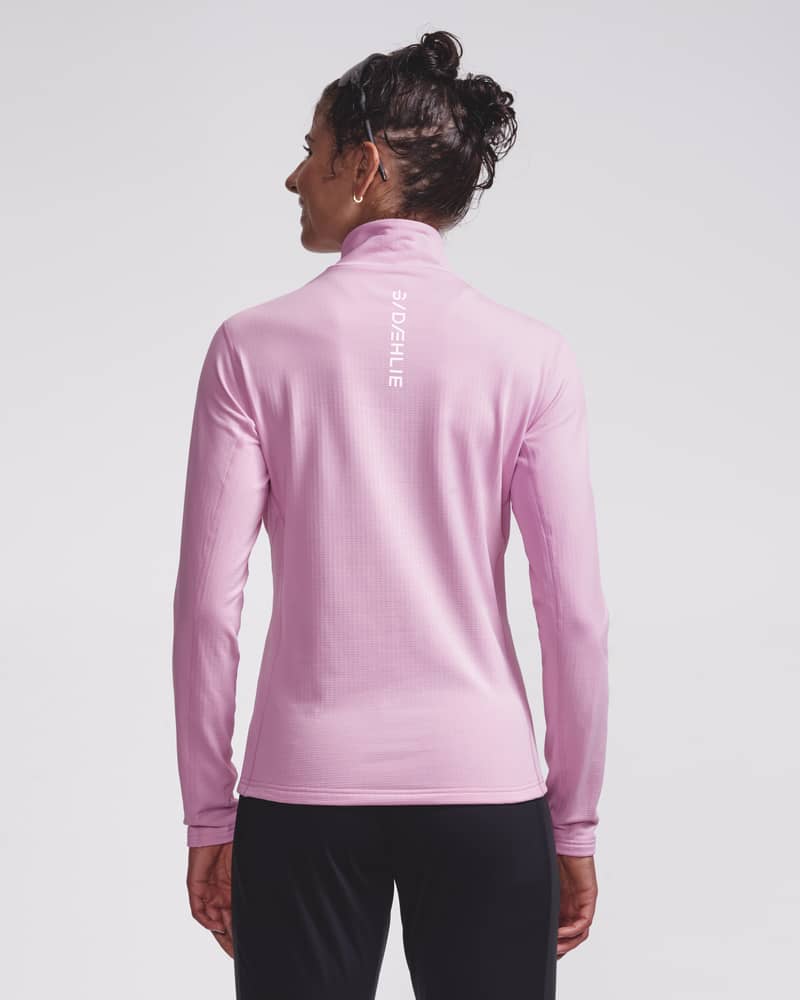 Pink ribbed half-zip midlayer top, back view on model