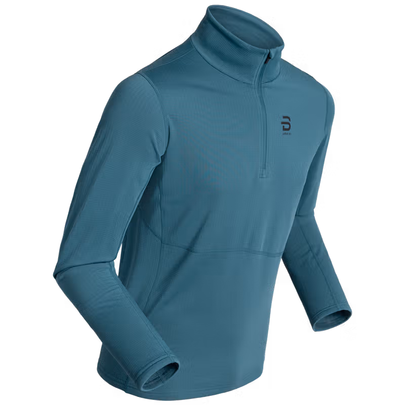 Dæhlie men's teal midlayer half-zip top, front view product photo.