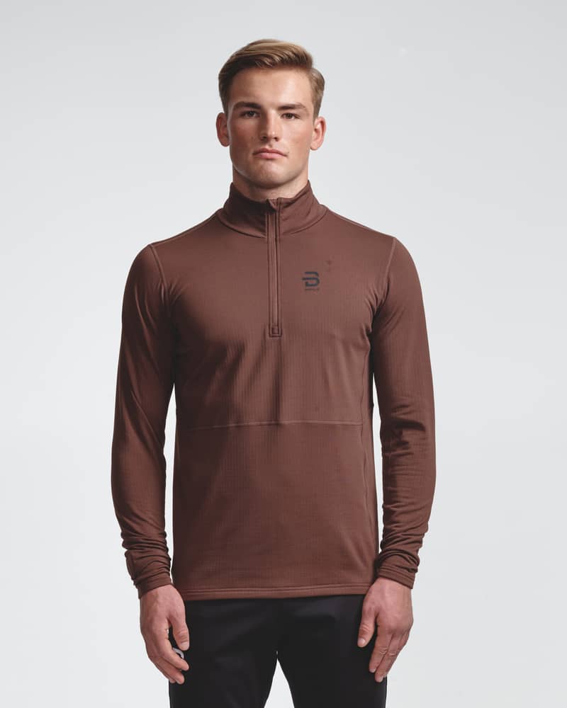 Brown quarter-zip long sleeve top, front view on model