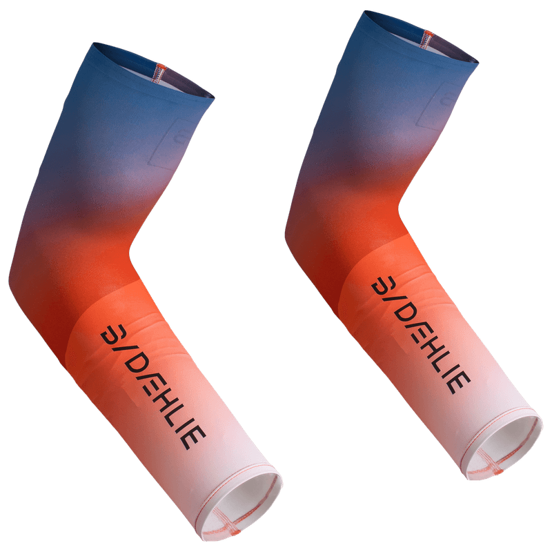 Dæhlie Elite Sleeves in a blue and orange gradient, featuring the brand logo for visibility and style on race day.