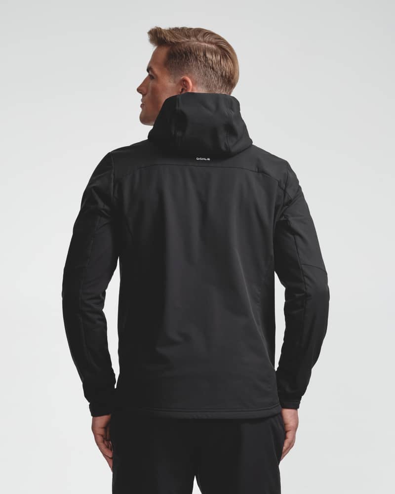 Black hooded softshell midlayer jacket with hood up, back view on model