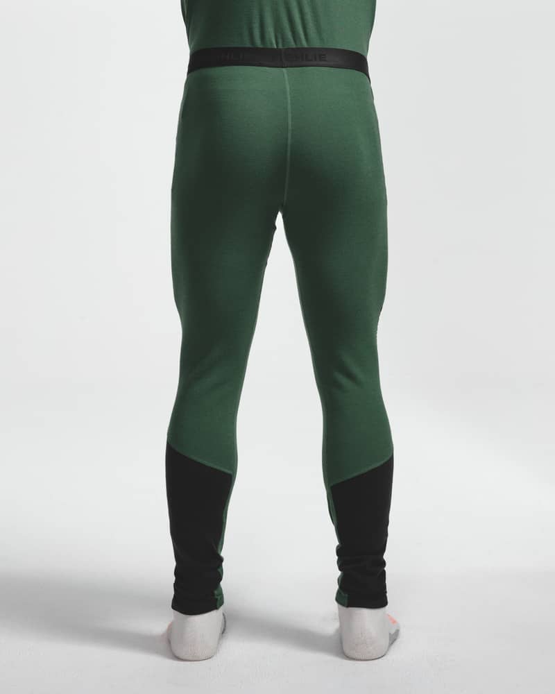 Dæhlie green baselayer leggings with black ankle panels on male model, back view