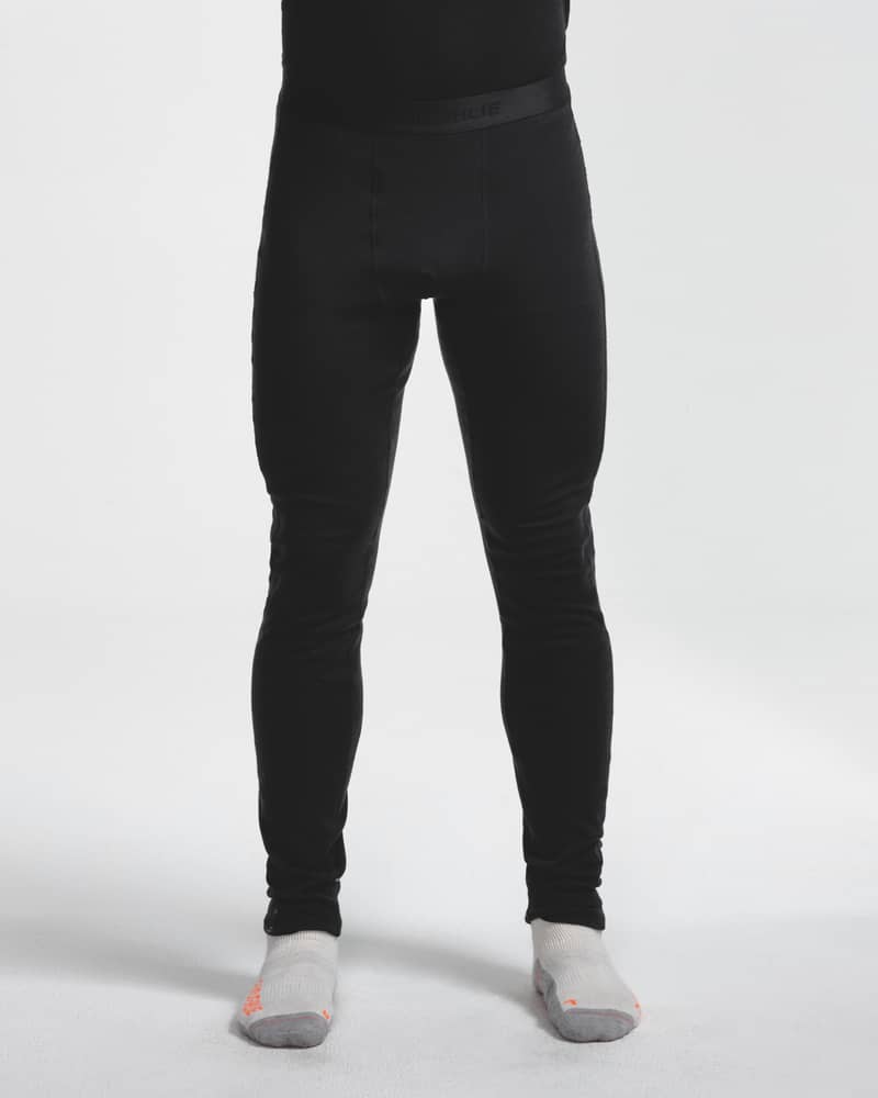 Dæhlie black baselayer leggings on male model, front view close-up
