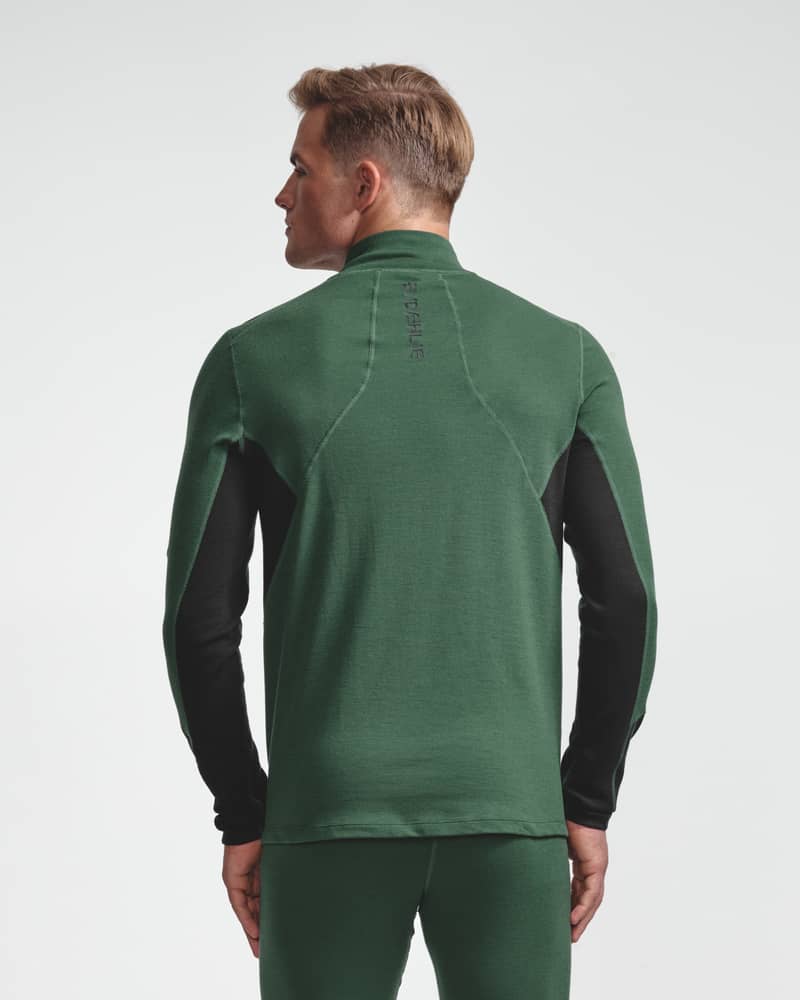 Dæhlie green half-zip baselayer top and matching leggings on male model, back view